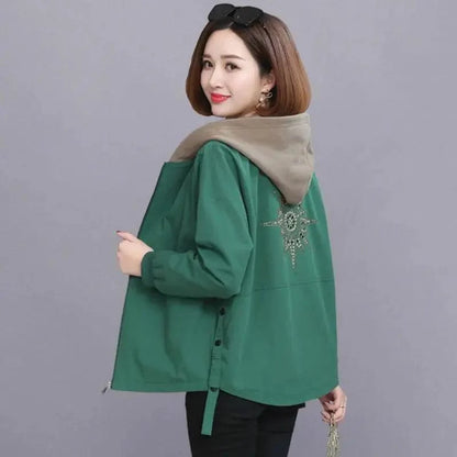 Green hooded windbreaker jacket by Stevvex with beige hood lining and rhinestone back motif on Tampa Home & Garden Store