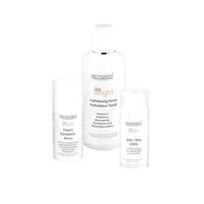 Dermoskin Be Bright anti-aging skincare set with white bottles on Tampa Home & Garden Store