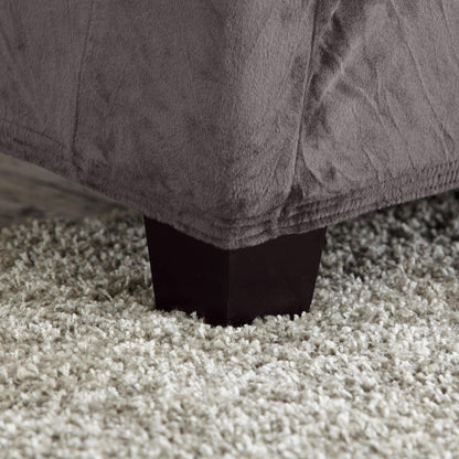 Velvet stretch slipcover Gale Collection gray for Great Bay Home, close-up of hem edge on furniture leg on Tampa Home & Garden Store