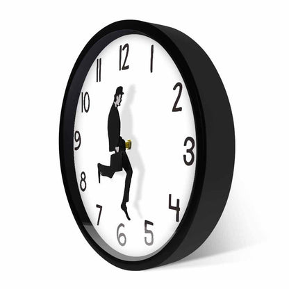 Wall Clock Stevvex with black frame, white dial, walking silhouette design on Tampa Home & Garden Store
