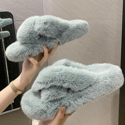 Pair of light blue fluffy fur slippers with cross-band open-toe design, cozy indoor slides on Tampa Home & Garden Store