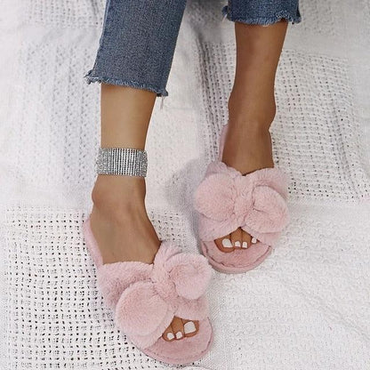 Stevvex pink fluffy slippers pair with large bow, faux fur cross-band open-toe indoor slides on Tampa Home & Garden Store