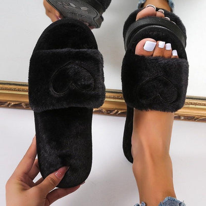 Black faux fur slippers with heart-shaped strap, open-toe memory foam indoor slides on Tampa Home & Garden Store