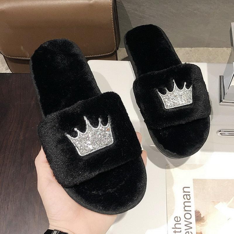 Stevvex black faux fur slippers with glitter crown patch, open-toe indoor slides, pair on Tampa Home & Garden Store