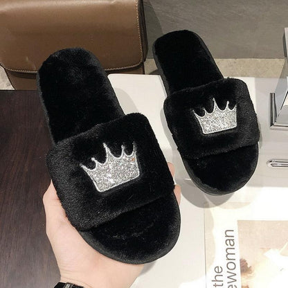 Stevvex black faux fur slippers with glitter crown patch, open-toe indoor slides, pair on Tampa Home & Garden Store