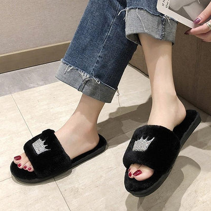 Stevvex women's black plush fur slippers with silver crown emblem indoor slides on Tampa Home & Garden Store