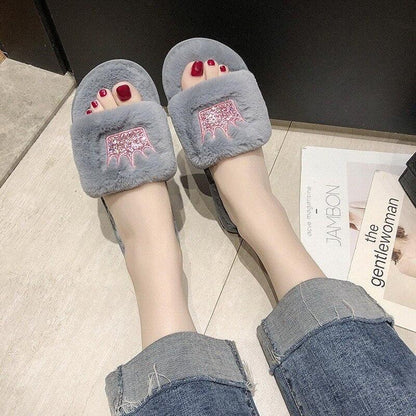 Gray faux-fur slippers with fluffy wide strap, memory-foam interior for indoor comfort on Tampa Home & Garden Store