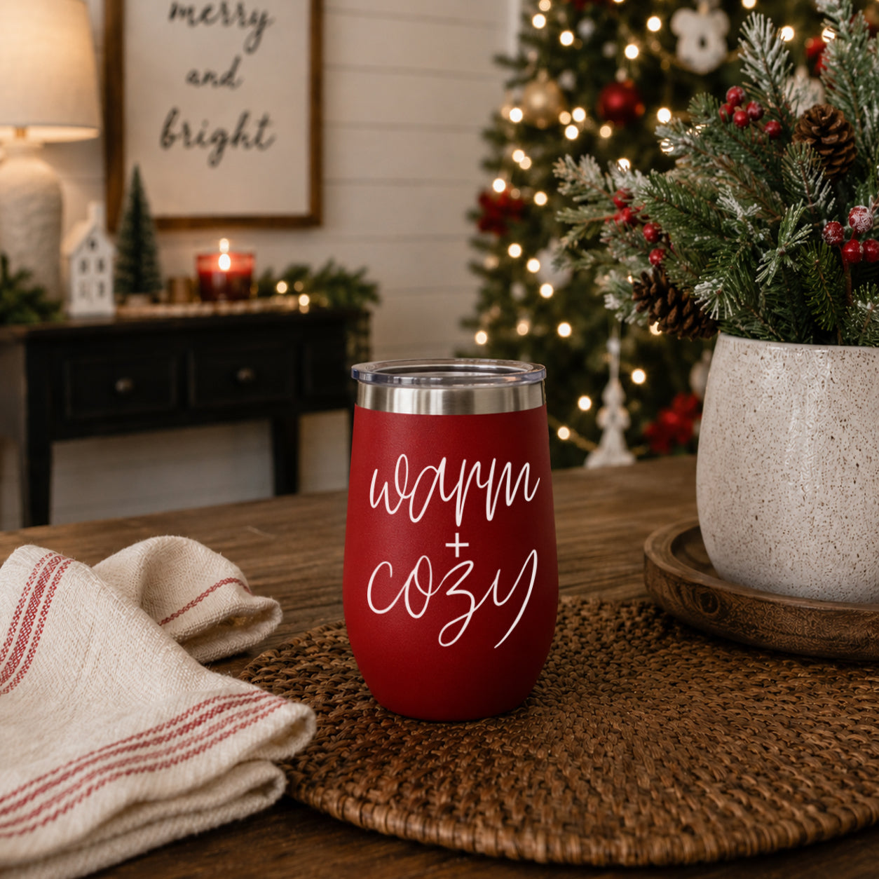 Gia Roma Warm + Cozy 17oz tumbler red on woven placemat with festive decor on Tampa Home & Garden Store