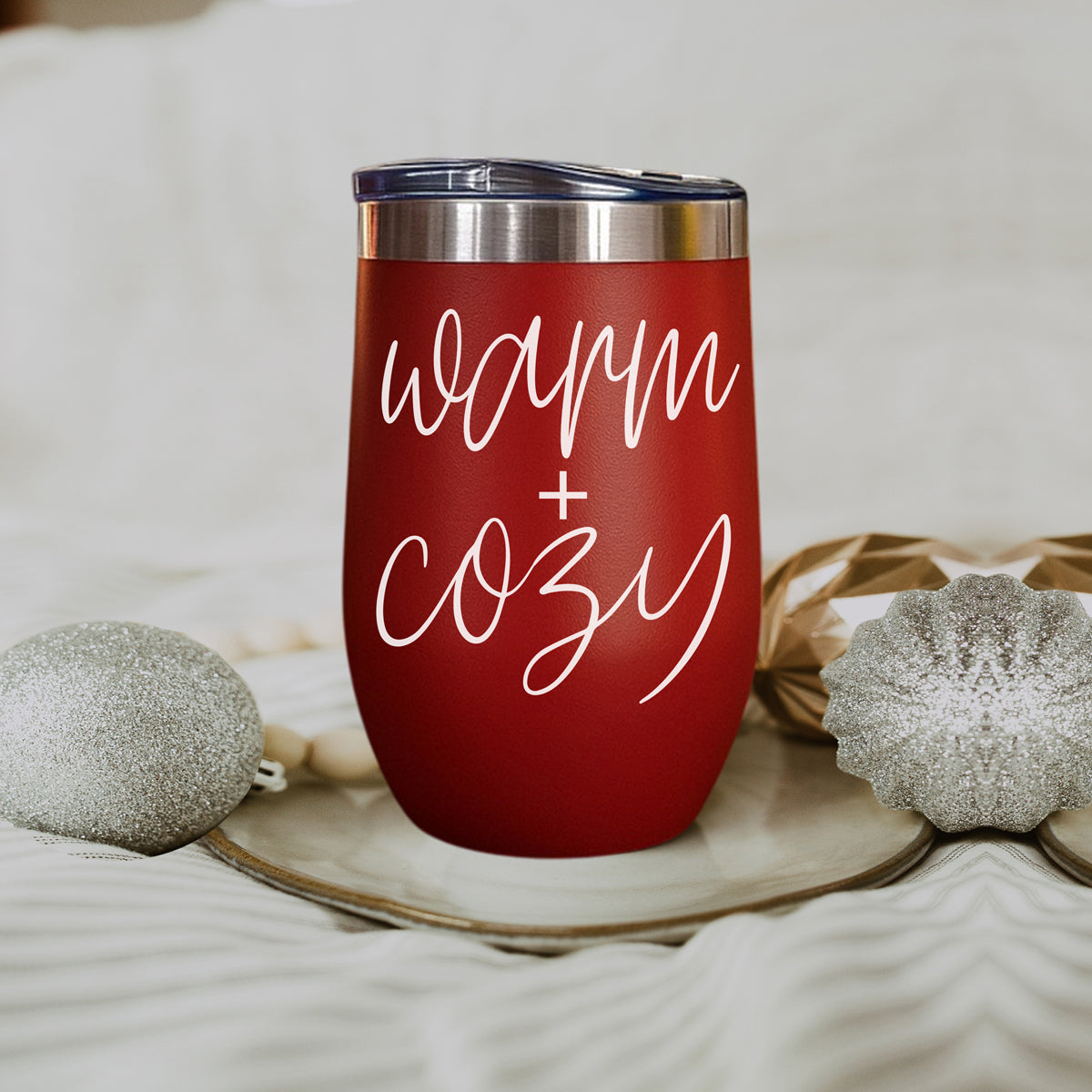 Gia Roma 17oz red tumbler with stainless steel lid featuring Warm + Cozy script on Tampa Home & Garden Store