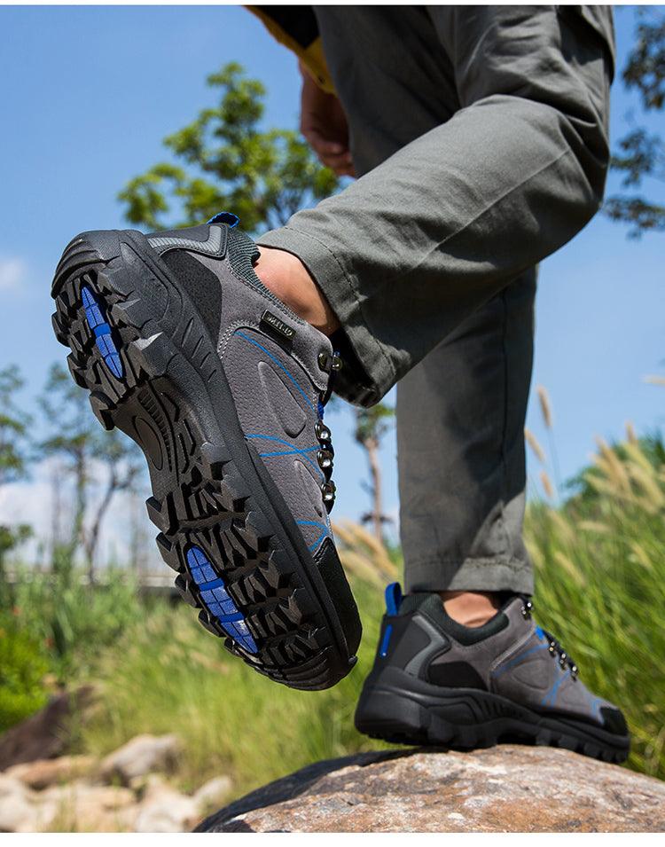Waterproof hiking boots by Stevvex, grey/black with blue accents, rugged slip-resistant outsole on Tampa Home & Garden Store