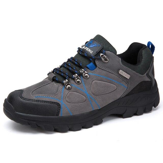 Stevvex waterproof hiking boots, grey/black with blue accents and rugged outsole on Tampa Home & Garden Store