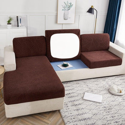 Waterproof Stevvex brown sofa seat cover set on beige sectional; reversible water resistant on Tampa Home & Garden Store