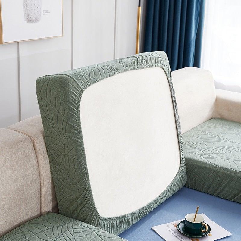 Waterproof sofa seat cover with green leaf pattern; reversible cushion wrap for lounge on Tampa Home & Garden Store