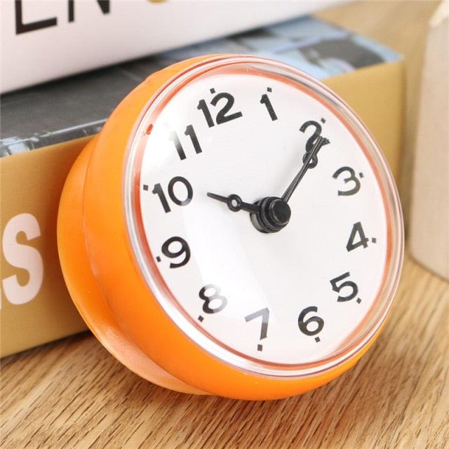 Stevvex orange waterproof mini wall clock with white dial and black numerals battery-operated on Tampa Home & Garden Store