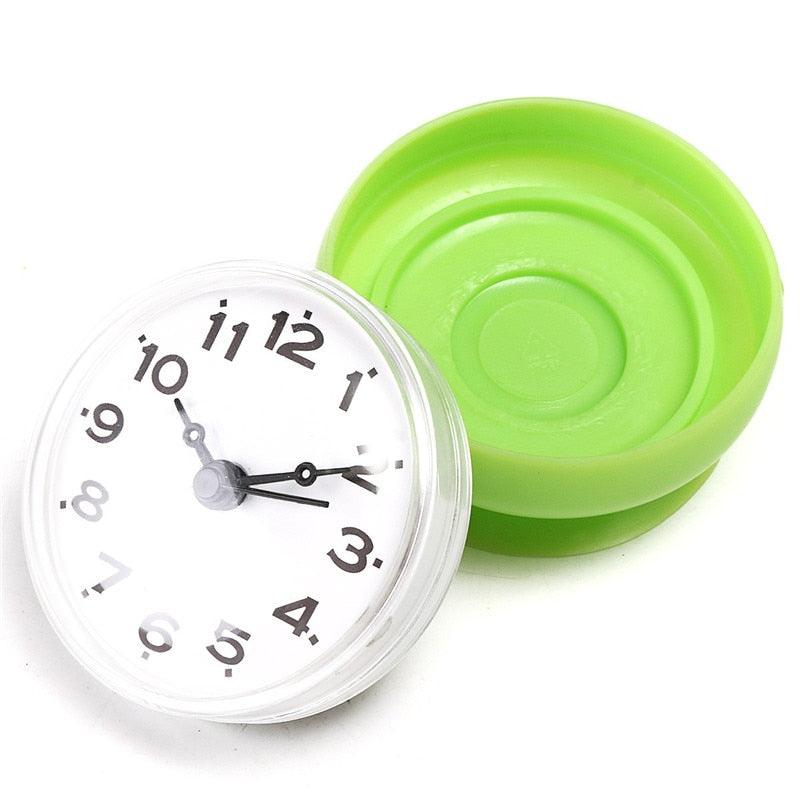 Waterproof shower wall clock with suction cup green base, white dial and black numerals on Tampa Home & Garden Store