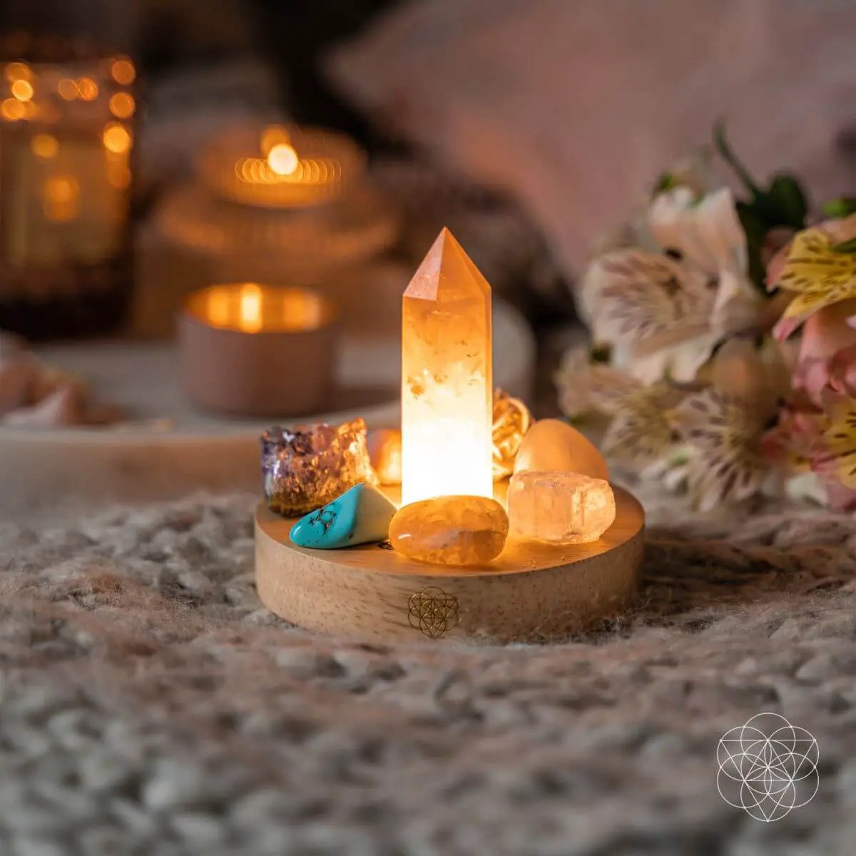 Wealth Goddess Night Light by Conscious Items with a crystal quartz obelisk and stones on base on Tampa Home & Garden Store