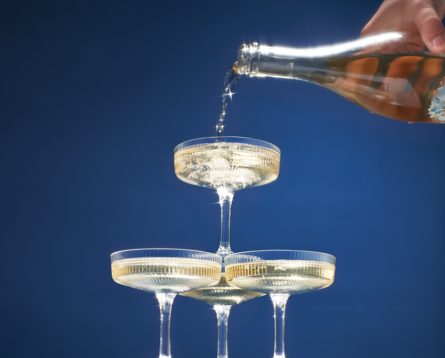 Stylish Como Champagne Coupe Glasses and Drinks