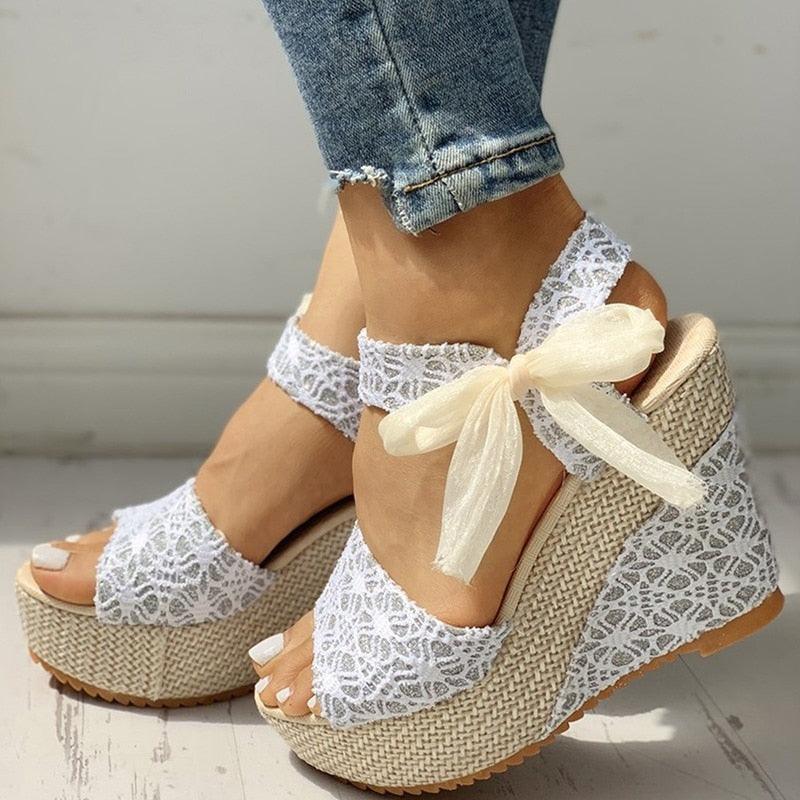 Wedding lace wedge sandals by Stevvex with white lace straps and bow on jute platform espadrille on Tampa Home & Garden Store