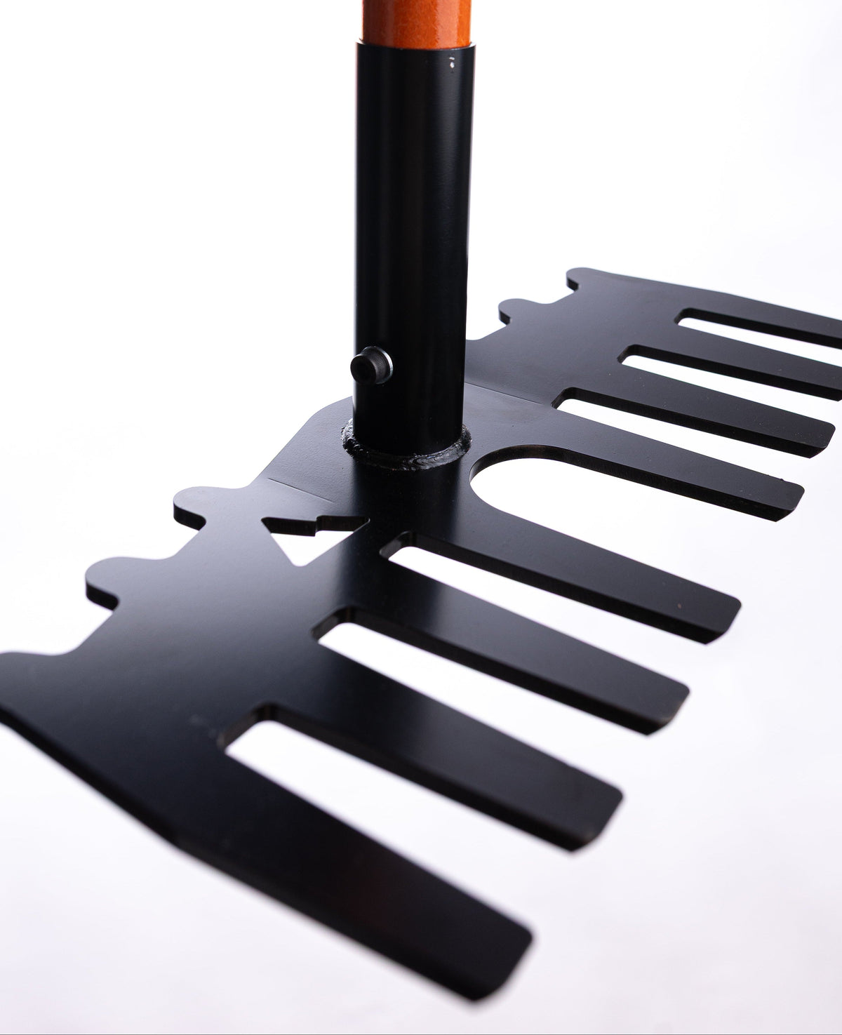 Weston rake from Backslope Tools, black metal rake head with orange wooden handle on Tampa Home & Garden Store