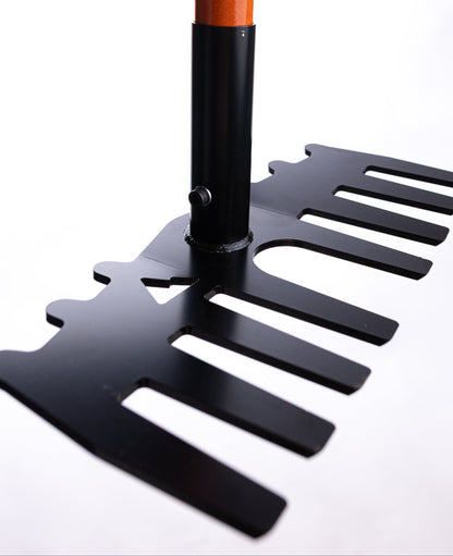 Weston rake from Backslope Tools, black metal rake head with orange wooden handle on Tampa Home & Garden Store