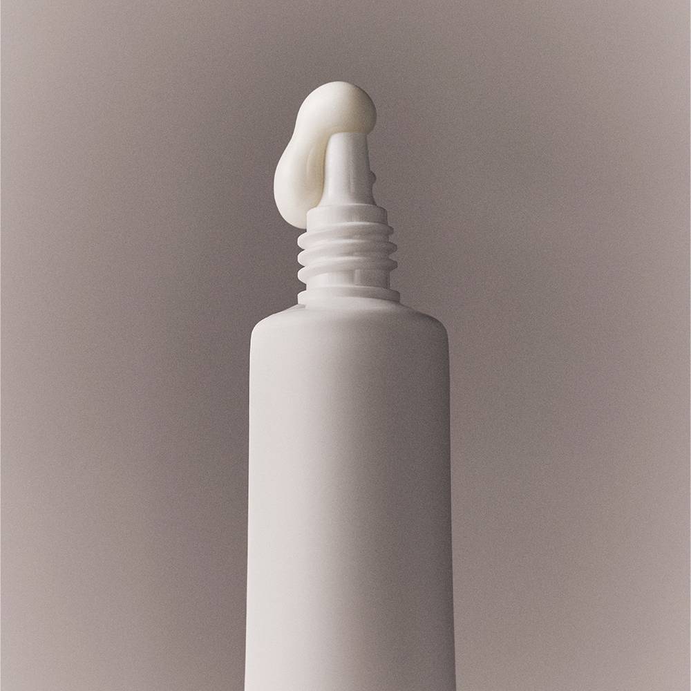 Whamisa Organic Flowers Eye Essence 30ml eye serum in a white pump bottle on Tampa Home & Garden Store