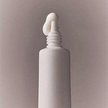 Whamisa Organic Flowers Eye Essence 30ml eye serum in a white pump bottle on Tampa Home & Garden Store