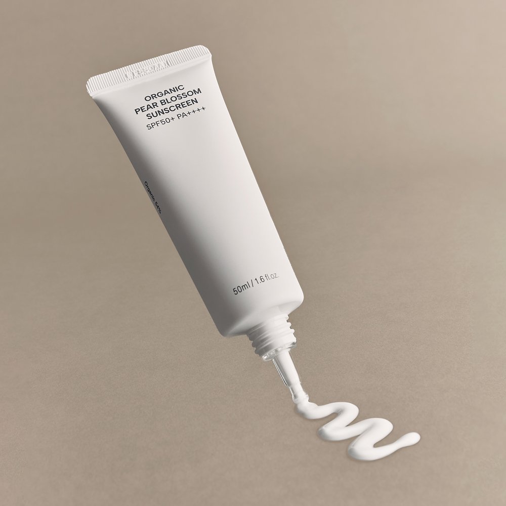 Whamisa Organic Pear Blossom Sunscreen SPF50+ PA++++ 50ml white tube with cream swirl on Tampa Home & Garden Store