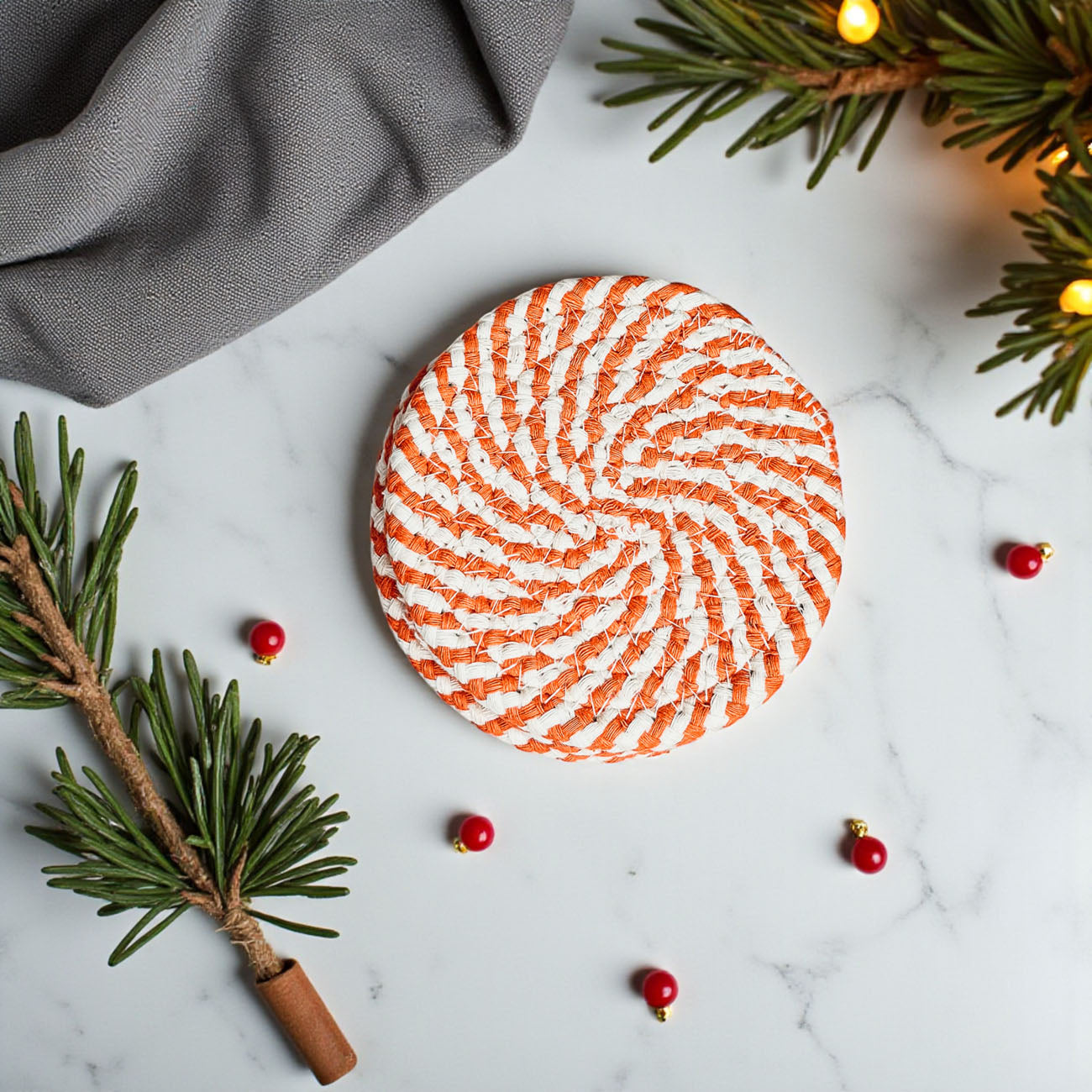 Fall Fabric Coasters Gia Roma, round orange and white woven design on Tampa Home & Garden Store