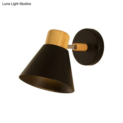 Decorbites wall sconce black conical shade with wood accent and round backplate on Tampa Home & Garden Store