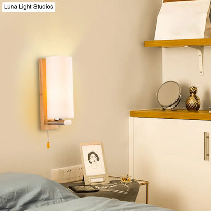 White Glass Wall Sconce - Cylindrical Bedside Light with Pull Chain