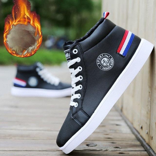 Stevvex black leather high-top sneakers, pair, white sole, logo badge, red-white-blue pull tab on Tampa Home & Garden Store
