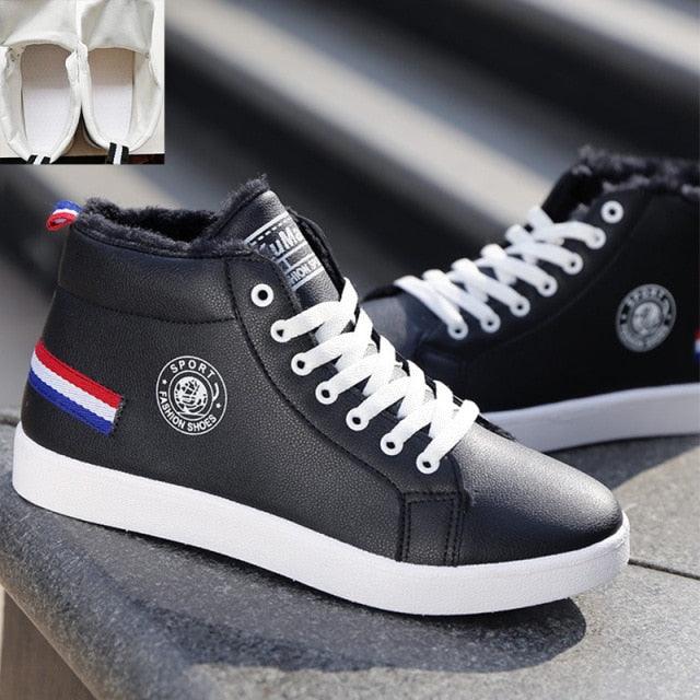 Stevvex black leather high-top sneakers with white laces, plush lining, circular logo patch on Tampa Home & Garden Store