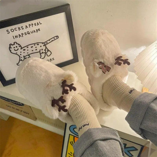 White fuzzy slippers with antler appliques memory foam Stevvex slippers on Tampa Home & Garden Store