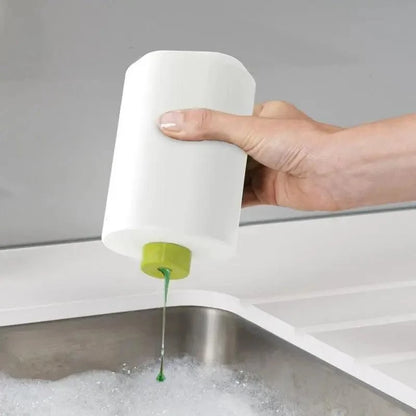 White kitchen soap dispenser with pump and green nozzle over sink on Tampa Home & Garden Store