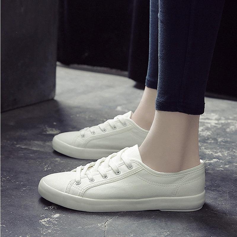 Stevvex white women's sneakers with lace-up canvas, cushioned sole on Tampa Home & Garden Store