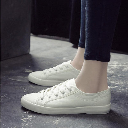 Stevvex white women's sneakers with lace-up canvas, cushioned sole on Tampa Home & Garden Store