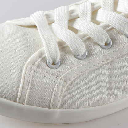 Sneakers white canvas Stevvex with cotton laces and rubber sole close-up eyelets stitching on Tampa Home & Garden Store