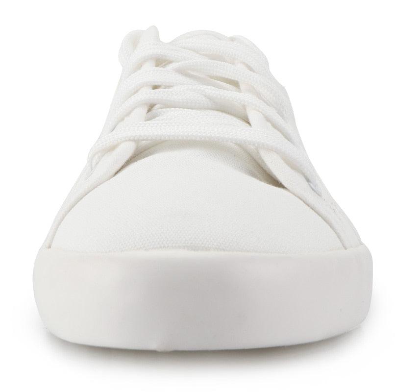 Stevvex white sneakers, canvas upper with cotton laces, casual walking flats front view on Tampa Home & Garden Store
