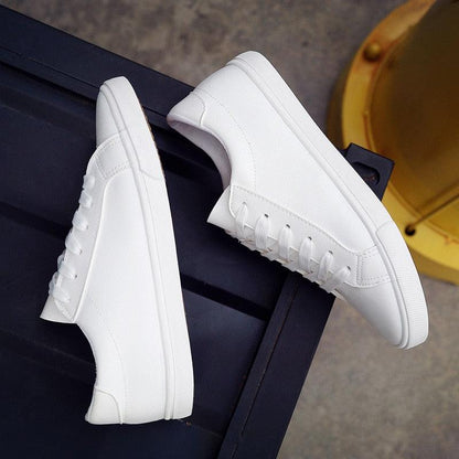 Stevvex white sneakers, leather and canvas upper, casual walking flats, pair on Tampa Home & Garden Store