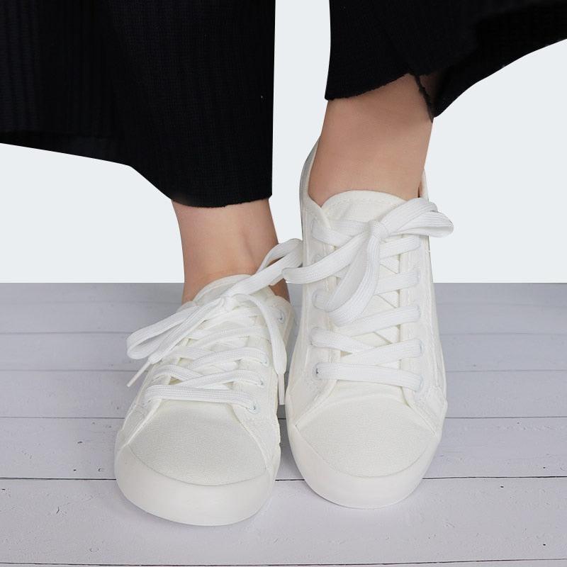 Stevvex women's white canvas leather sneakers with laces for casual walking on Tampa Home & Garden Store