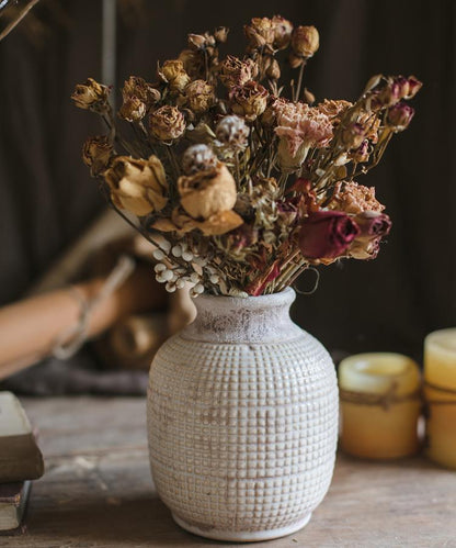 White textured porcelain jar vase by RusticReach with dried bouquet on Tampa Home & Garden Store