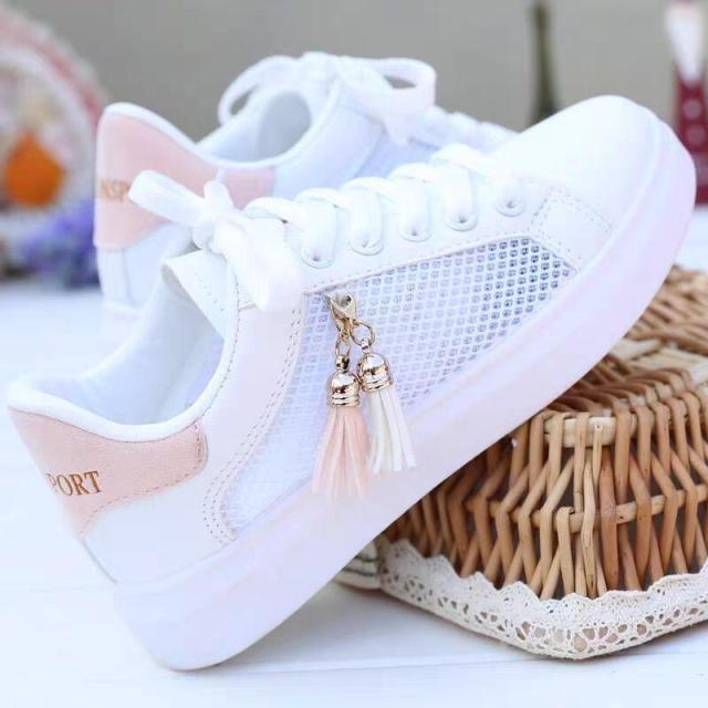 Stevvex white breathable low-top sneakers with lace-up front and tassel charm on Tampa Home & Garden Store