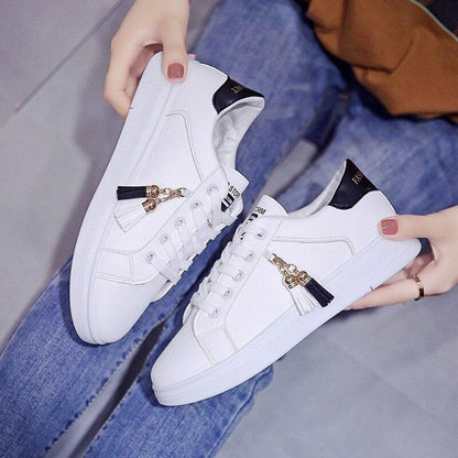 White lace-up sneakers by Stevvex low-top casual flats with tassel charms for women on Tampa Home & Garden Store