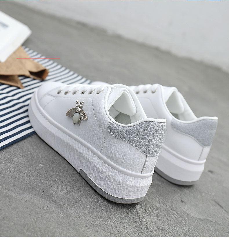 White platform sneakers with lace-up front, silver glitter heel, rhinestone bee charm on Tampa Home & Garden Store