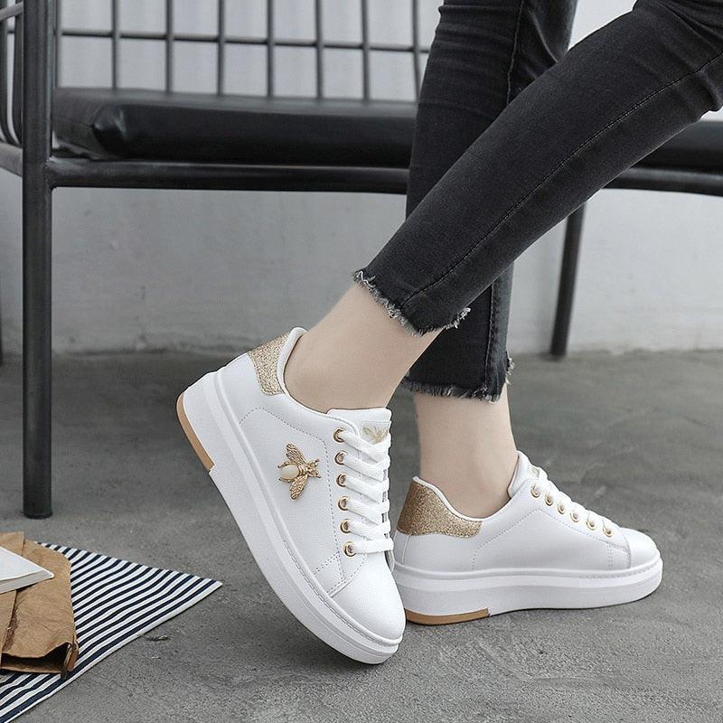 White Stevvex platform sneakers with gold glitter accents and bee emblem lace-up casual shoes on Tampa Home & Garden Store