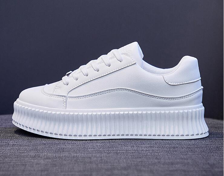 Stevvex white leather platform sneakers with thick, ribbed sole and lace-up design on Tampa Home & Garden Store