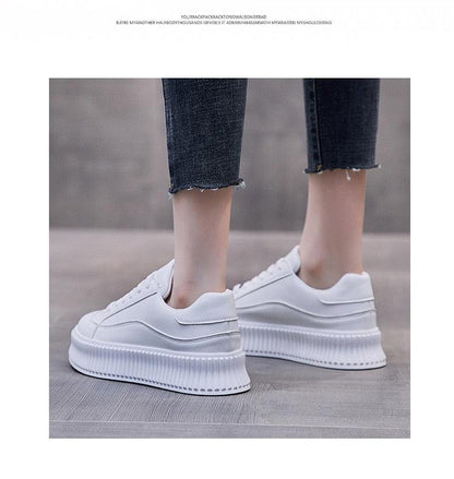 Stevvex white platform sneakers with leather upper and chunky sole, model in cropped jeans on Tampa Home & Garden Store