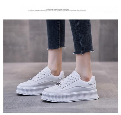 Stevvex white women platform sneakers with leather upper and thick ribbed sole, two shoes shown on Tampa Home & Garden Store