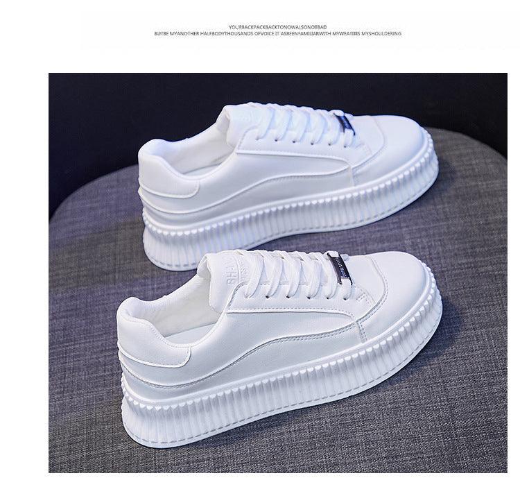 Pair of white Stevvex platform sneakers with chunky sole and leather upper on Tampa Home & Garden Store
