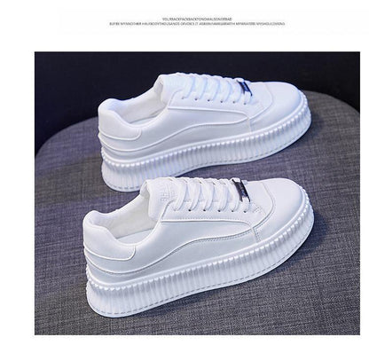 Pair of white Stevvex platform sneakers with chunky sole and leather upper on Tampa Home & Garden Store
